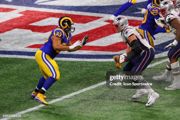 Los Angeles Rams nose tackle Ndamukong Suh battles New England Patriots tight end Rob Gronkowski during the second quarter of Super Bowl LIII between...