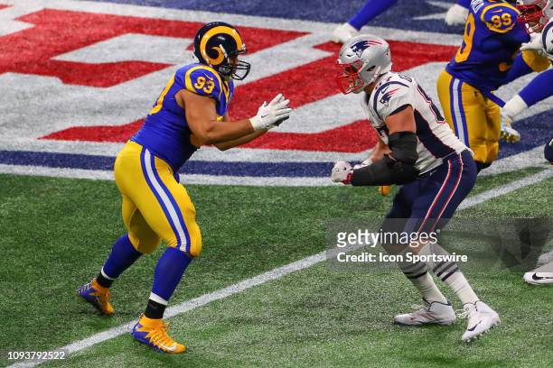 Los Angeles Rams nose tackle Ndamukong Suh battles New England Patriots tight end Rob Gronkowski during the second quarter of Super Bowl LIII between...