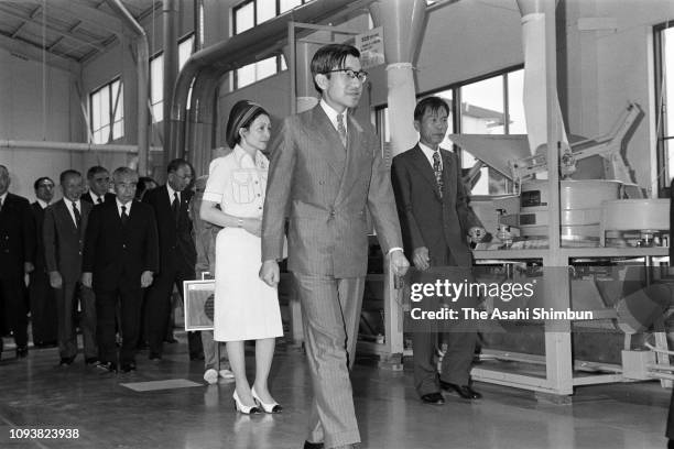 Crown Prince Akihito and Crown Princess Michiko visit the Saga Prefecture Agriculture Research Center on September 20, 1976 in Ureshino, Saga, Japan.