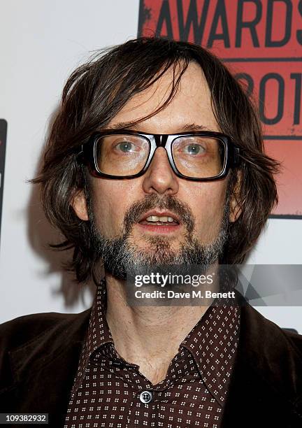 Musician Jarvis Cocker poses against the Shockwaves NME Awards 2011 winners boards at Brixton Academy on February 23, 2011 in London, England.