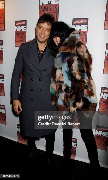 Jamie Hince and Alison Mosshart of The Kills pose against the Shockwaves NME Awards 2011 winners boards at Brixton Academy on February 23, 2011 in...