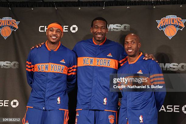 Amar'e Stoudemire, Chauncey Billups and Carmelo Anthony of the New York Knicks pose during the press conference prior to the game against the...