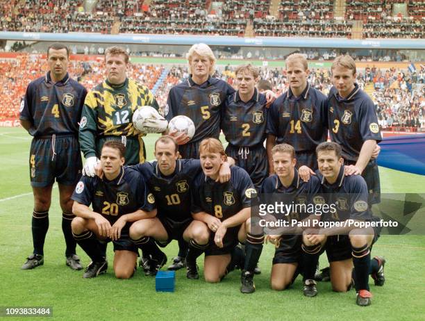 Scotland line up for a group photo before the UEFA Euro 1996 Group A match between the Netherlands and Scotland at Villa Park on June 10, 1996 in...