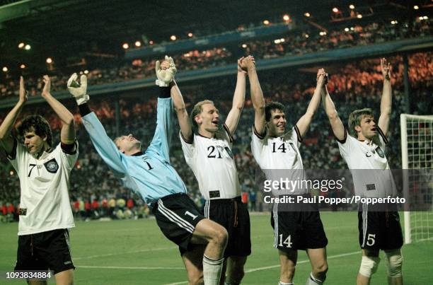 Left-right: Andreas Moller, Andreas Kopke, Dieter Eilts, Markus Babbel and Thomas Helmer of Germany celebrate after the UEFA Euro 1996 Final between...