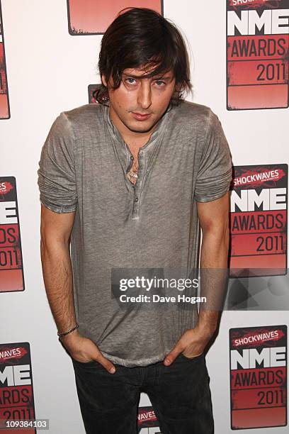 Carl Barat poses in front of the winners boards at the Shockwaves NME Awards 2011 held at Brixton Academy on February 23, 2011 in London, England.