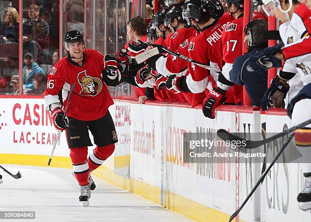 Bobby Butler of the Ottawa Senators celebrates his second-period goal against the Florida Panthers with teammates at Scotiabank Place on February 23,...