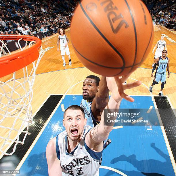 Kevin Love of the Minnesota Timberwolves goes to the basket against Tony Allen of the Memphis Grizzlies during the game on February 23, 2011 at...