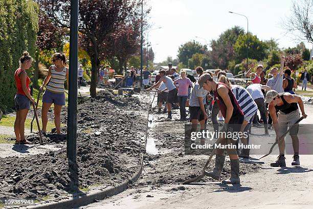 Members of Canterbury University volunteer army clean up liquefaction on February 24, 2011 in Christchurch, New Zealand. A massive search and rescue...