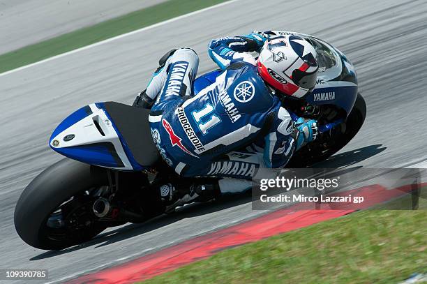 Ben Spies of USA and Yamaha Factory Racing rounds the bend during the third day of testing at Sepang Circuit on February 24, 2011 in Kuala Lumpur,...