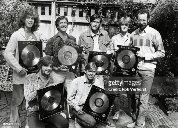 Roxy Music collecting gold discs for sales of the album Avalon at the Pullitzer Hotel, Amsterdam, Netherlands, 5th September 1982, L-R Andy Newmark,...