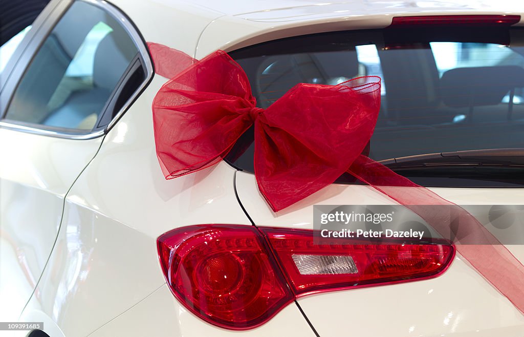 Car Red Ribbin New Car With Red Ribbon And Red Bow High-Res Stock Photo - Getty Images