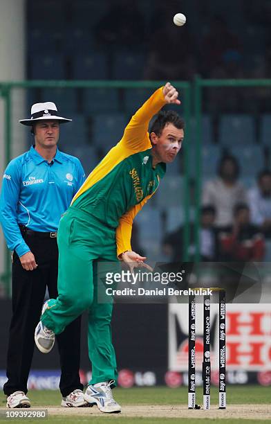 Johan Botha of South Africa bowls during the 2011 ICC World Cup Group B match between West Indies and South Africa at Feroz Shah Kotla Stadium on...