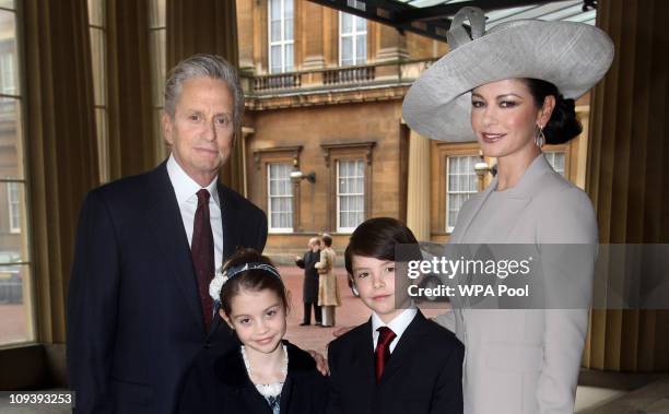 Actress Catherine Zeta-Jones arrives with her husband, actor Michael Douglas and their children Dylan and Carys Douglas, to attend a Royal...