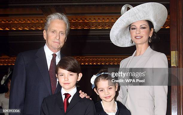 Actress Catherine Zeta-Jones arrives with her husband, actor Michael Douglas and their children Dylan and Carys Douglas, to attend a Royal...