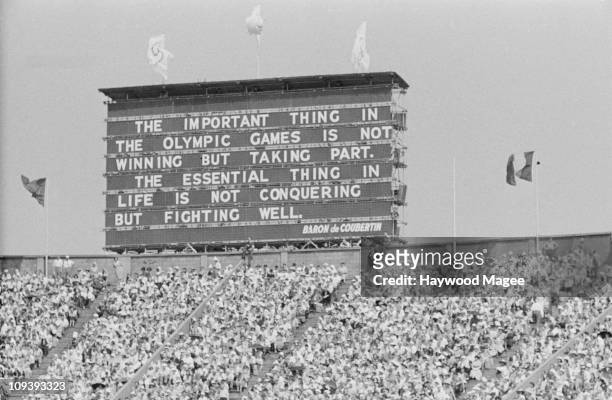 Scoreboard bearing a quote by founder of the modern olympics Pierre de Coubertin, at the opening ceremony of the Olympic Games Wembley Stadium,...