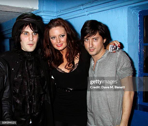 Noel Fielding poses with Carl Barat and guest at the Shockwaves NME Awards 2011 held at the Brixton Academy on February 23, 2011 in London, England.