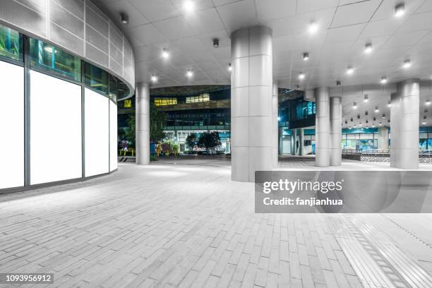 metal roof structure of office building - advertising column stock pictures, royalty-free photos & images