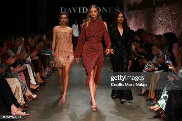 Victoria Lee, Gemma Ward and Jessica Gomes pose on the runway during the David Jones AW19 Season Launch 'The Art of Living' at The Museum of Old and...