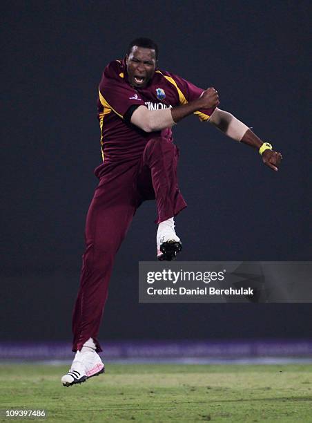 Kieron Pollard of West Indies celebrates the wicket of Graeme Smith of South Africa during the 2011 ICC World Cup Group B match between West Indies...