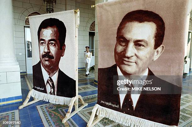 Effigies of Egyptian President Hosni Mubarak and Iraqi President Saddam Hussein are exposed, on June 15, 1989 during the opening of the Arab...