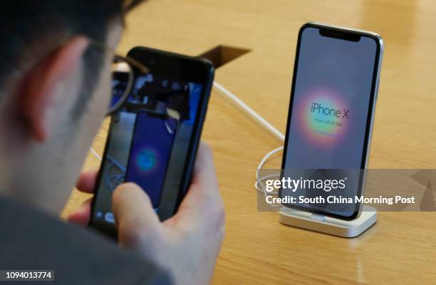 People try out the new iPhone X at the Apple Store in Causeway Bay. 03NOV17 SCMP / Nora Tam