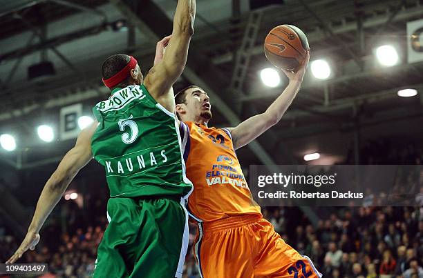 Nando De Colo, #22 of Power Electronics Valencia competes with Marcus Brown, #5 of Zalgiris Kaunas in action during the 2010-2011 Turkish Airlines...