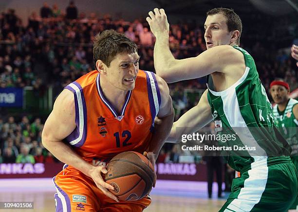 Serhiy Lischuk, #12 of Power Electronics Valencia competes with Trent Plaisted, #44 of Zalgiris Kaunas in action during the 2010-2011 Turkish...