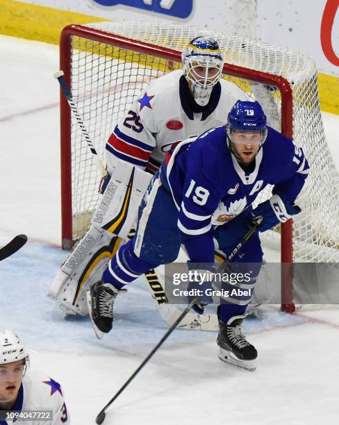 Chris Mueller of the Toronto Marlies puts a screen on goalie Scott Wedgewood of the Rochester Americans during AHL game action on January 12, 2019 at...