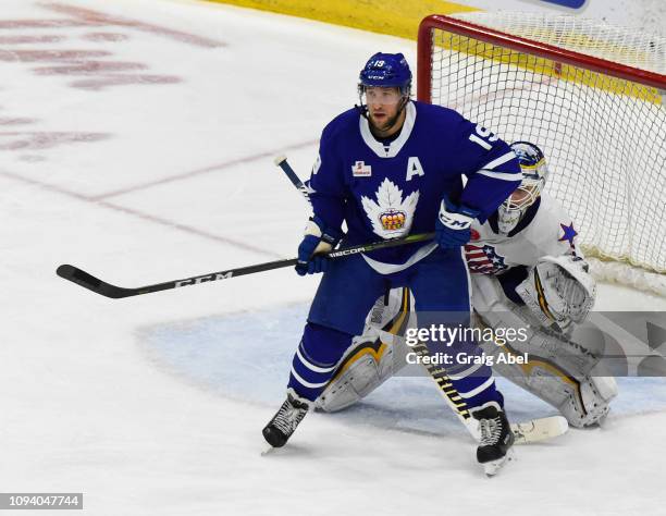 Chris Mueller of the Toronto Marlies puts a screen on goalie Scott Wedgewood of the Rochester Americans during AHL game action on January 12, 2019 at...