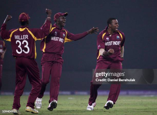 Kieron Pollard of West Indies celebrates the wicket of Graeme Smith of South Africa during the 2011 ICC World Cup Group B match between West Indies...