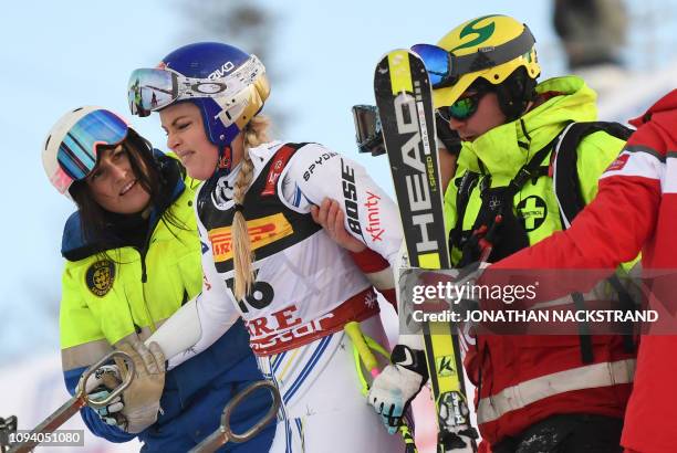 Lindsey Vonn of the US gets help after she crashed during the women's Super G event of the 2019 FIS Alpine Ski World Championships at the National...