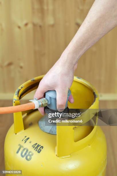 lpg gas bottle, butane gas cylinders - lpg-installation stock pictures, royalty-free photos & images