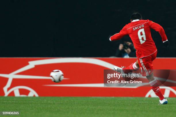 Eduardo Salvio of Benfica scores his team's first goal during the UEFA Europa League match round of 32 second leg between VfB Stuttgart and Benfica...