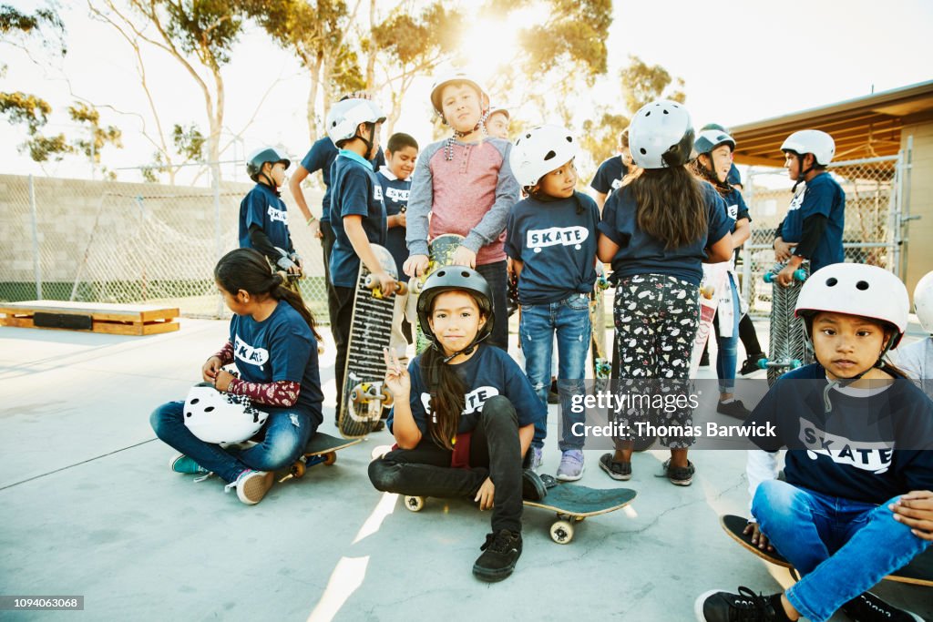 Skateboard students hanging out during summer camp