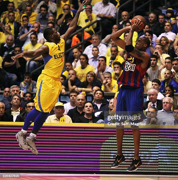 Terence Morris, #23 of Regal FC Barcelona competes with Jeremy Pargo, #4 of Maccabi Electra Tel Aviv in action during the 2010-2011 Turkish Airlines...