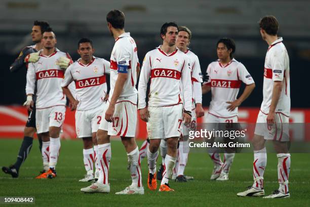 Players of Stuttgart react after the UEFA Europa League match round of 32 second leg between VfB Stuttgart and Benfica at Mercedes-Benz Arena on...