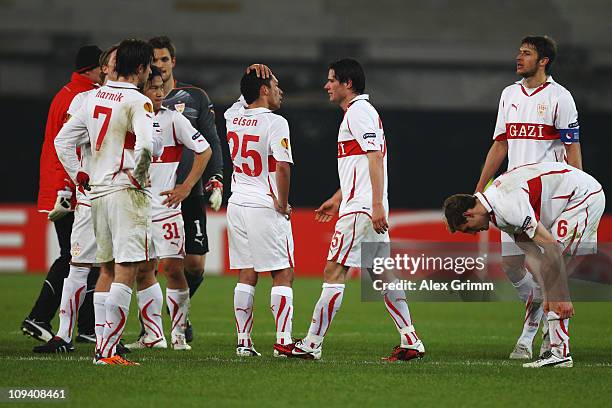 Players of Stuttgart react after the UEFA Europa League match round of 32 second leg between VfB Stuttgart and Benfica at Mercedes-Benz Arena on...