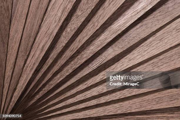 fan shape brown wood slices - abrir en abanico fotografías e imágenes de stock