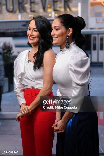 Professional Wrestlers Brie Bella and Nikki Bella visit "Extra" at The Levi's Store Times Square on January 14, 2019 in New York City.