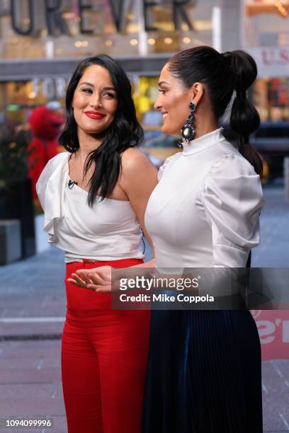 Professional Wrestlers Brie Bella and Nikki Bella visit "Extra" at The Levi's Store Times Square on January 14, 2019 in New York City.