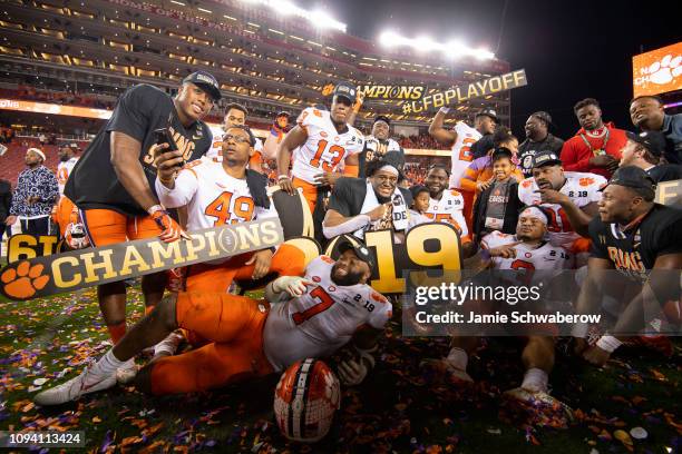 The Clemson Tigers celebrate after defeating the Alabama Crimson Tide during the College Football Playoff National Championship held at Levi's...