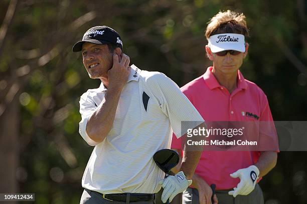 Jonathan Kaye reacts to his errant drive as Brad Faxon looks on during the first round of the Mayakoba Golf Classic at Riviera Maya-Cancun held at El...