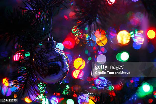 christmas lights on tree with boken - string light stock pictures, royalty-free photos & images