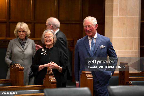 President of the Supreme Court, Baroness Brenda Hale , shows Britain's Prince Charles, Prince of Wales and Britain's Camilla, Duchess of Cornwall...