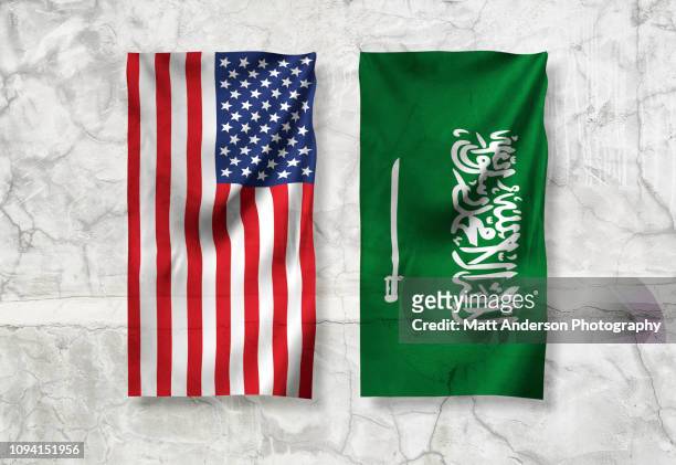 saudi arabia flag us flag texture - mid atlantic bundesstaaten der usa stock-fotos und bilder