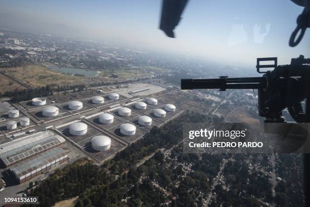 Aerial view of the Mexican oil company PEMEX oil complex in Azcapotzalco, on the outskirts of Mexico City, taken on February 4, 2019 as soldiers...