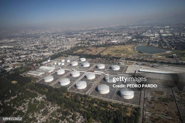 Aerial view of the Mexican oil company PEMEX oil complex in Azcapotzalco, on the outskirts of Mexico City, taken on February 4, 2019 as - Since...