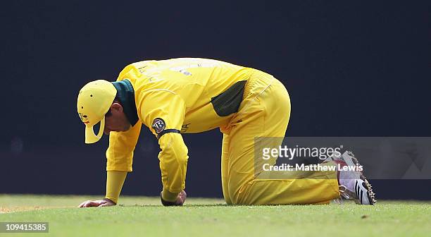 Ricky Ponting, captain of Australia looks on, after hurting his hand during the 2011 ICC World Cup Group A match between Australia and New Zealand at...