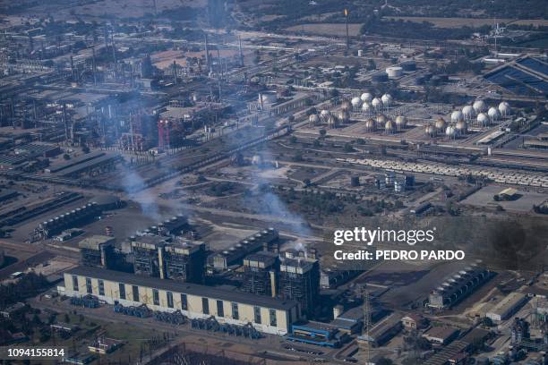 Aerial picture showing a Pemex oil complex in Tula, Hidalgo State, Mexico, taken on February 4, 2019 from an Air Force Blackhawk helicopter during an...