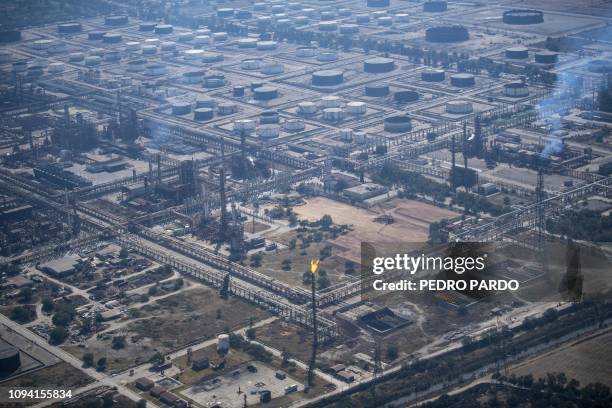 Aerial picture showing a Pemex oil complex in Tula, Hidalgo State, Mexico, taken on February 4, 2019 from an Air Force Blackhawk helicopter during an...